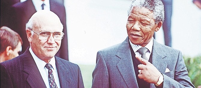 THEN South African President FW de Klerk, left, with the future president Nelson Mandela in 1990.