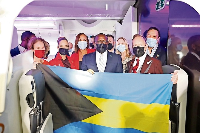 DEPUTY Prime Minister Chester Cooper welcomes the Virgin Atlantic flight as it arrives at Lynden Pindling International Airport yesterday. 
Photo: Racardo Thomas/ Tribune Staff