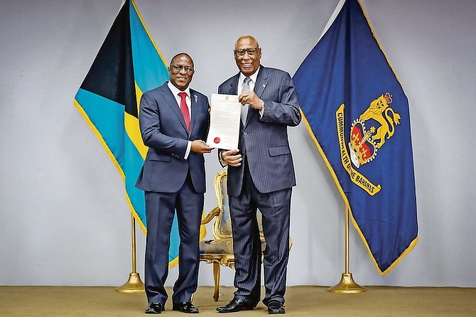 FNM party leader Michael Pintard being presented with his instruments of appointment by Governor General Cornelius A Smith. 
Photo: Racardo Thomas/Tribune Staff