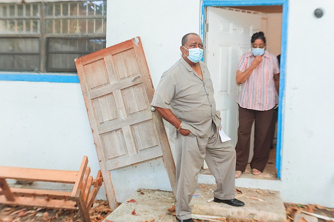 THE REV CB Moss at the storage building broken into by thieves. 
Photo: Donavan McIntosh/Tribune Staff