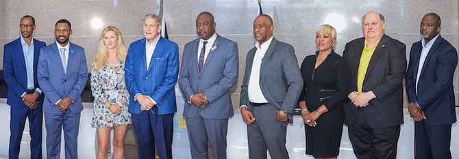 SHOWN, from left, are director of sports Tim Munnings, Larry Maples of Middle Tennessee, Lea Miller-Tooley, executive director of Complete Sports Management, Bahamas Bowl executive director Richard Giannini, Minister of Youth, Sports and Culture Mario Bowleg, Greg Burrows of the Ministry of Sports, “Golden Girl” Eldece Clarke of the Ministry of Tourism, David Nottke of Toledo and Quinton Brennen of the National Sports Authority. 
Photos by Donavan McIntosh/Tribune staff