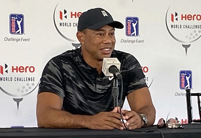 TIGER Woods holds his first press conference since his February 23 car crash in Los Angeles at the Hero World Challenge golf tournament in Nassau, Bahamas, yesterday. 
(AP Photo/Doug Ferguson)