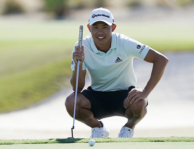 COLLIN MORIKAWA, of the United States, studies his putt on the 18th hole during yesterday’s Pro-Am tournament ahead of the Hero World Challenge PGA Tour at the Albany Golf Club.
(AP Photo/Fernando Llano)