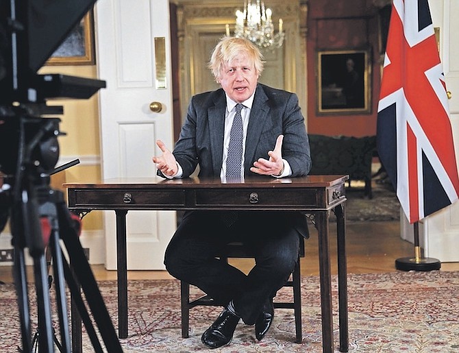 BRITISH Prime Minister Boris Johnson giving an address to the nation at Downing Street, London, on the booster vaccine programme on Sunday. Photo: Kirsty O’Connor/AP