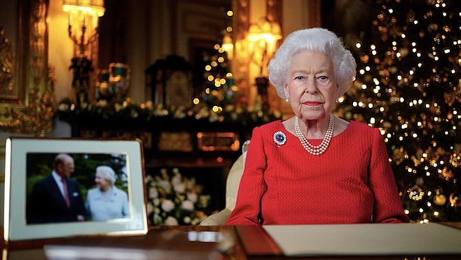QUEEN Elizabeth II during her annual Christmas broadcast. The photograph at left shows The Queen and Prince Philip taken in 2007.
