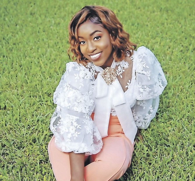 STRONGER than ever - Grand Bahamian teacher Markel Williams is working through the trauma she
experienced as a child and inspiring others to do the same with her new book, “Messages from God”.