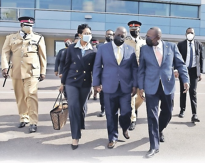 PRIME Minister Philip “Brave” Davis and Ann Marie Davis departing Nassau for Dubai, accompanied by Minister of Youth, Sports and Culture Mario Bowleg. On hand to see the Prime Minister off were Deputy Prime Minister and Minister of Tourism, Investments and Aviation Chester Cooper and Acting Commissioner of Police Clayton Fernander.
PHOTO: Kemuel Stubbs/BIS
