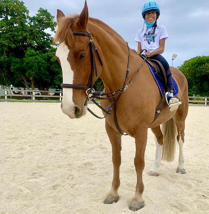 Jayda loves horseback riding at Camperdown Equestrian Center.