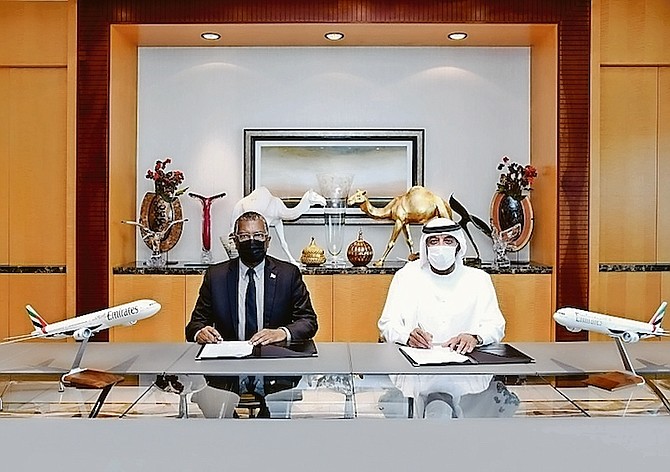 THE SIGNING of the Memorandum of Understanding by Minister of Foreign Affairs Fred Mitchell and
HH Sheikh Ahmed bin Saeed Al Maktoum, chairman of Emirates Group.