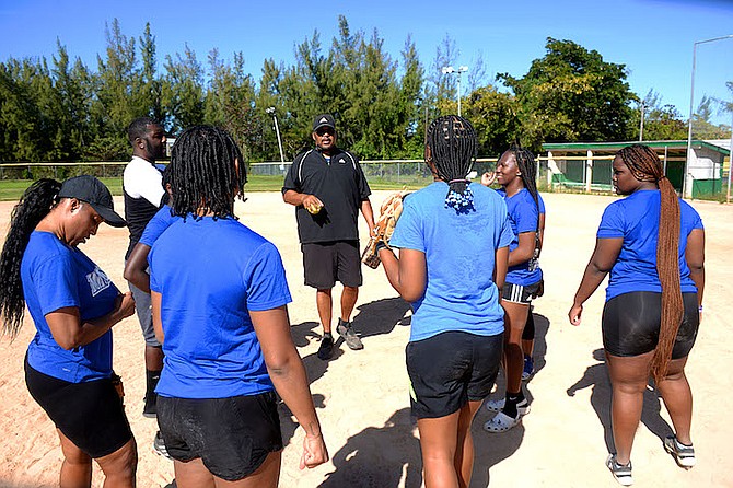 UNIVERSITY of The Bahamas women’s softball team members gather for a meeting after practice Saturday at Bankers’ softball field. The team is scheduled to play three international games this week in Miami Gardens, Florida. 
Photos courtesy of UB ATHLETICS