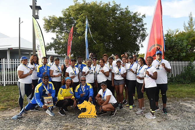 BAHAMAS Roadmasters Running Club members share a special moment.