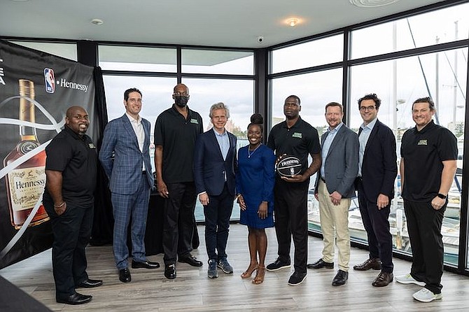 SHOWN, from left to right, Moses Johnson (BBF executive), Paul Auriol (Moet/Hennessy managing director of Central America and the Caribbean, Eugene Horton (BBF president), Laurent Boillot (Hennessy
President and CEO), Mia Marshall, Commonwealth Brewery Hennessy Brand Manager), JR Cadot (senior men’s national team player), Boris de Vroomen (Hennessy international director), Thomas
Mulliez (Moet/Hennessy managing director for Latin America and the Caribbean), John-Marc Nutt (BBF executive).