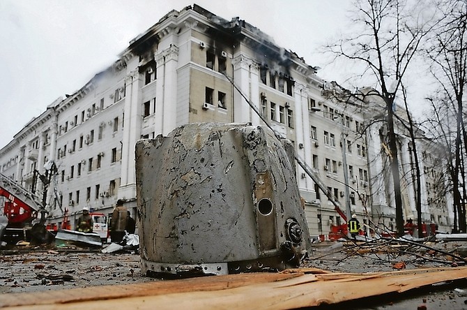 A ROCKET fragment lies on the ground next to a building of Ukrainian Security Service (SBU) after a rocket attack in Kharkiv, Ukraine’s second-largest city, Ukraine, Wednesday.
(AP Photo/Andrew Marienko)