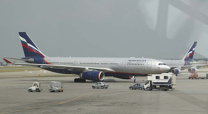 An Aeroflot international flight is prepared at Sheremetyevo airport in Moscow in 2013. (AP Photo/Sergei Grits, File photo)
