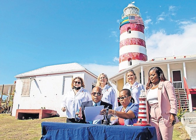 Elbow Reef Lighthouse Society directors (back row) Marjorie Chapman, treasurer; DP Patterson, secretary; Heather Forde-Prosa, president; with (front row) Senior Commander Berne Wright, Acting Port Controller; Permanent Secretary Antionette Thompson and JoBeth Coleby-Davis, Minister of Transportation and Housing.