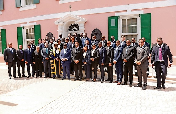 MEMBERS of Parliament outside the House of Assembly yesterday. Photo: Donavan McIntosh/Tribune Staff