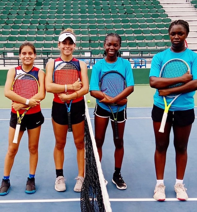 BAHAMAS girls’ doubles team of Jalisa Clarke and BreAnn Ferguson pose with their opponents from Costa Rica.