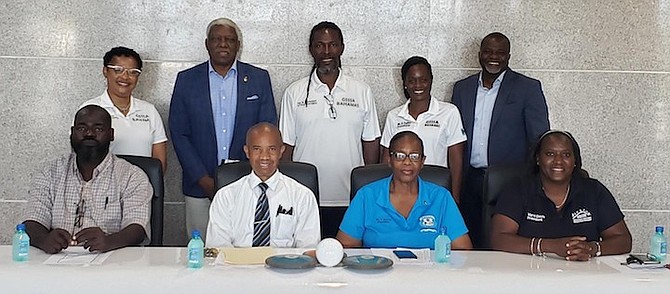 SEATED, from left to right, at the GSSSA press conference are Dwayne Higgins, Fritz Grant, Dr Virginia Romer and Varel Davis. Standing from left are Keisha Pratt, Mike Sands, Kendal Campbell, Fiona Tucker and Quinton Brennen.