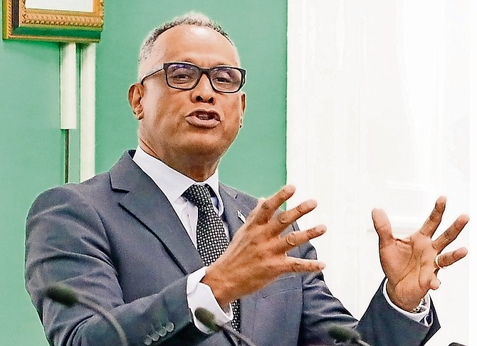 MINISTER of Health and Wellness Dr Michael Darville delivering his mid-year budget contribution
in Parliament yesterday. Photo: Donavan McIntosh/Tribune Staff