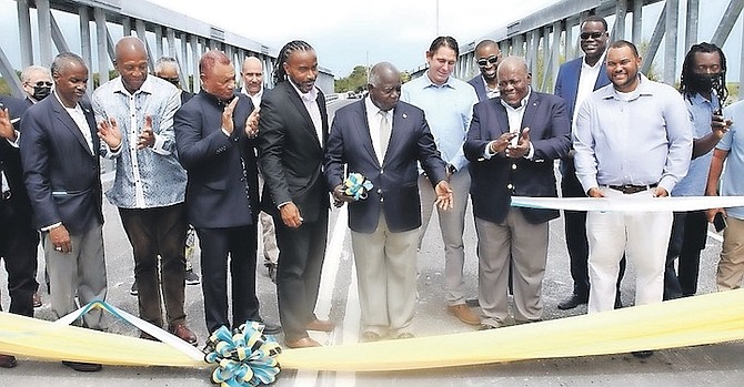 THE RIBBON is cut on the bridge that connects Great Abaco and Little Abaco. Photo: BIS