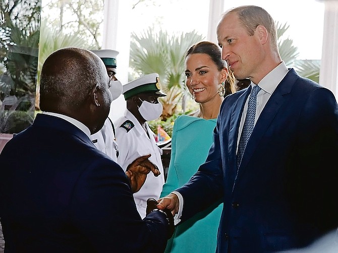 Prime Minister Philip 'Brave' Davis greets Prince William and Kate, the Duke and Duchess of Cambridge, at the Office of the Prime Minister. Photo: Eric Rose/BIS