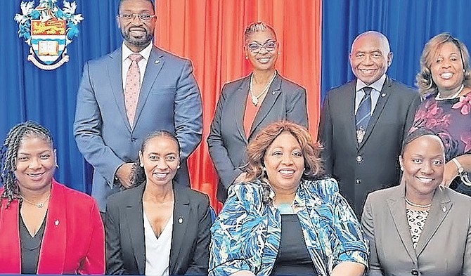 UWI Open Campus Bahamas board of directors: (standing, left to right) Charles Sealy, Vice Chair; Bridgette Cooper, Country Head; Dr Mortimer Moxey; Dr Yvonne Hunter-Johnson; (seated, left to right) Dr Kitiboni Rolle-Adderley; Terri Bellot; Marisa Mason- Smith, Chair; Dr Raveenia Hanna.