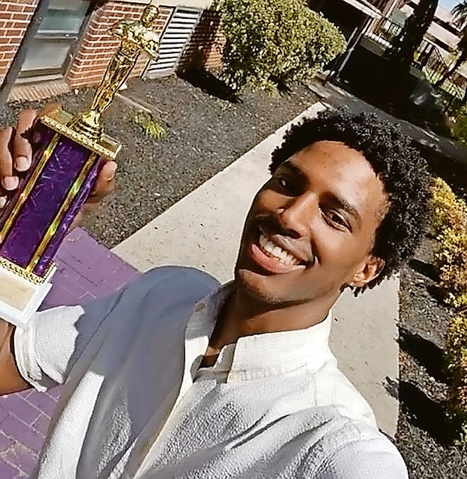 RAS Jesse Delancy receives Benedict College’s best all around volleyball player of the year honours.