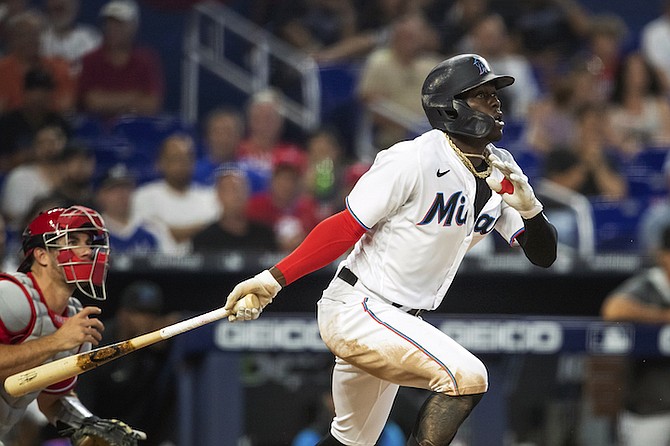 Miami Marlins second baseman Jazz Chisholm Jr. (2) hits during the fourth inning of a baseball game, Sunday in Miami. (AP Photo/Mary Holt)