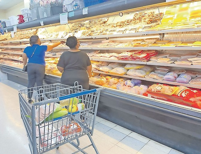 FOOD shoppers yesterday as concerns continue over rising prices with inflation soaring. Photo: Racardo Thomas/Tribune Staff