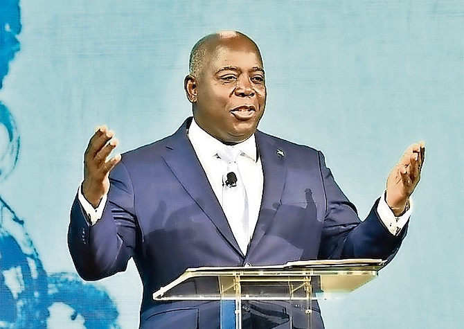 Prime Minister Philip “Brave” Davis addressing the Crypto Bahamas conference yesterday. 
Photo: BIS