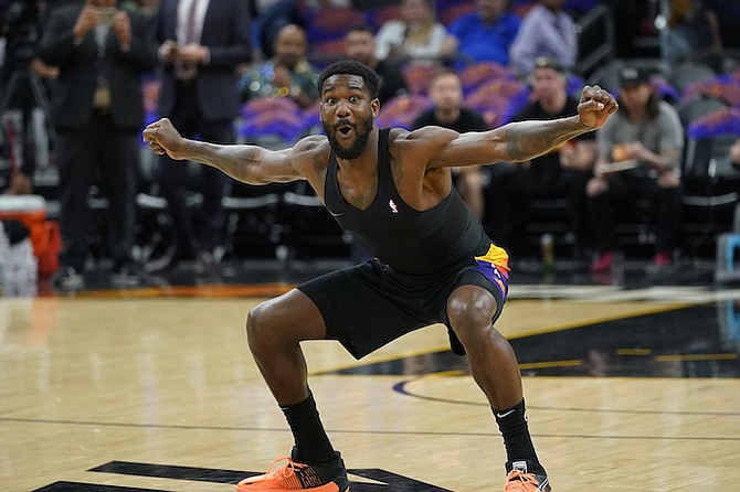 PHOENIX Suns centre Deandre Ayton reacts to a shot during pregame warmups before Game 1 in the second round of the NBA Western Conference playoff series against the Dallas Mavericks, on Monday night in Phoenix.
(AP Photo/Matt York)