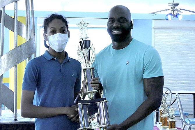 AVIAN PRIDE, left, the overall winner, and CM Kendrick Knowles, right, president of the Bahamas Chess Federation.