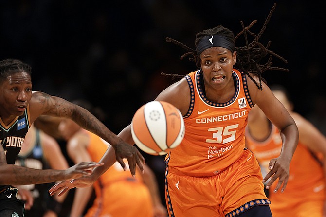 CONNECTICUT Sun forward Jonquel Jones (35) runs down a loose ball against the New York Liberty in the second half during a WNBA basketball game on Saturday in New York. The Liberty won 81-79. 
(AP Photo/Adam Hunger)