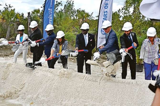 Prime Minister Philip “Brave” Davis and other officials dig the first shovels into the ground for the $200m Carnival Cruise Port. 
Photo: Vandyke Hepburn