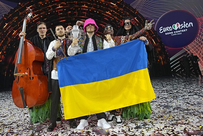 Kalush Orchestra from Ukraine celebrate after winning the Grand Final of the Eurovision Song Contest at Palaolimpico arena, in Turin, Italy, Saturday. (AP Photo/Luca Bruno)