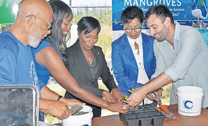 ANN MARIE DAVIS, wife of Prime Minister Philip “Brave” Davis, and Grand Bahama Minister Ginger Moxey at Coral Vita to launch a competition aimed at restoring mangroves. Photos: Vandyke Hepburn
