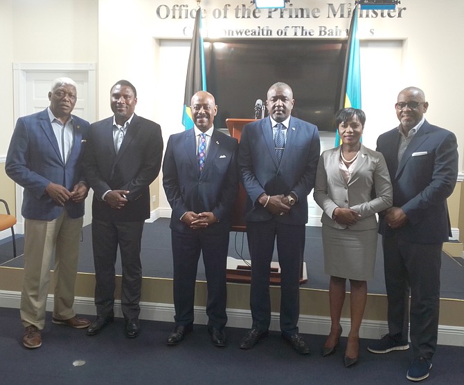 NACAC president Mike Sands, BAAA president Drumeco Archer, Minister of Social Services Obie Wilchcombe, Minister of Youth, Sports and Culture Mario Bowleg, Minister for Grand Bahama Ginger Moxey and Grafton Ifill Jr, government financial advisor.