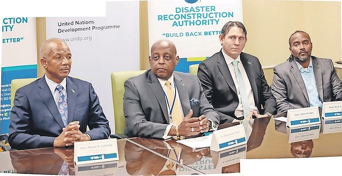 FROM left, Myles LaRoda, Minister of State in the Office of the Prime Minister and Disaster Preparedness, Management & Reconstruction Unit; Alex Storr, Disaster Reconstruction Authority executive chairman; John Pinder, Parliamentary Secretary of Tourism, Investments & Aviation; and Kirk Cornish, Parliamentary Secretary. Photo: Donavan McIntosh/Tribune Staff