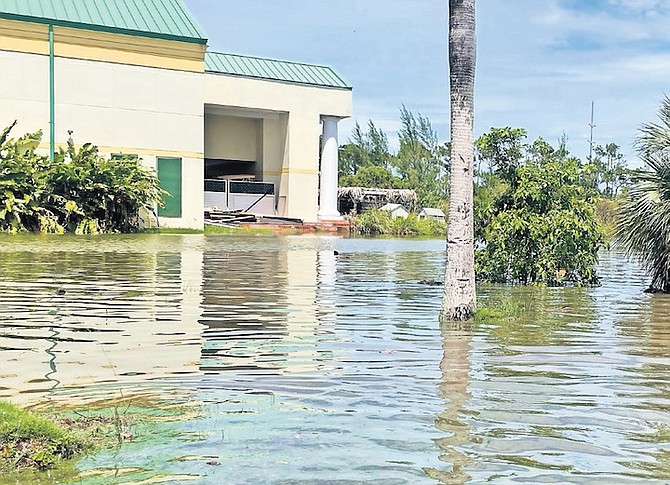 FLOODING in Blake Road yesterday.
Photo: Donavan McIntosh/Tribune Staff
