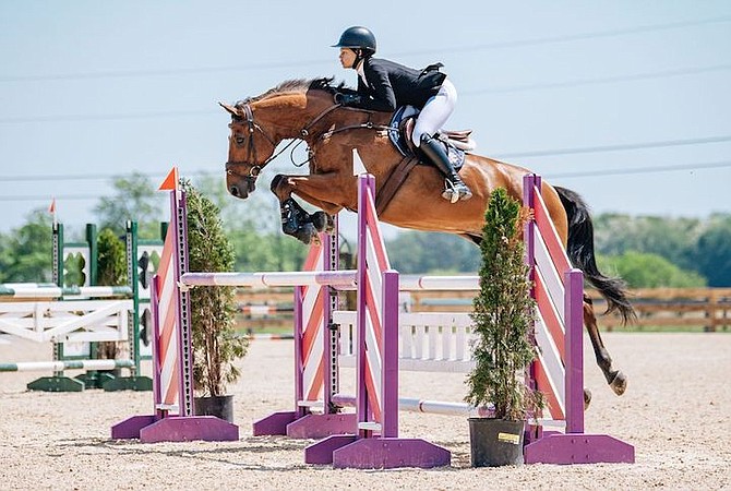 KACY Lyn Smith and Chicago M in action at the Upperville Horse Show in Middleburg, Virginia.
Photo courtesy of Maddie Valenzuela