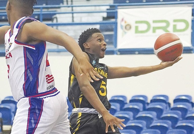 DESMOND Hall goes up for a layup against Costa Rica.