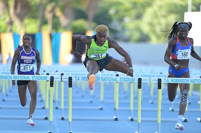 DEVYNNE Charlton in action in the 100m hurdles on Friday during the Bahamas Association of Athletic Associations National Championships. Photo: Kermit Taylor