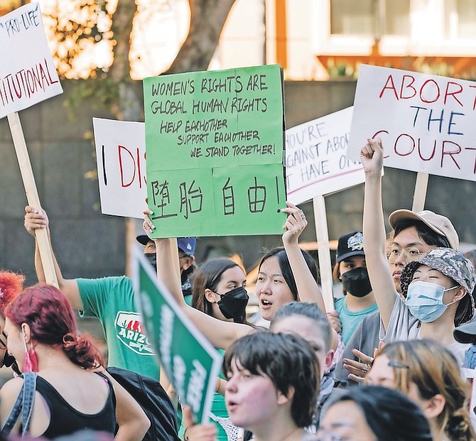 ABORTION rights activists hold a rally outside the First Street US Courthouse, Central District of California, in downtown Los Angeles, on Monday. Photo: Damian Dovarganes/AP
