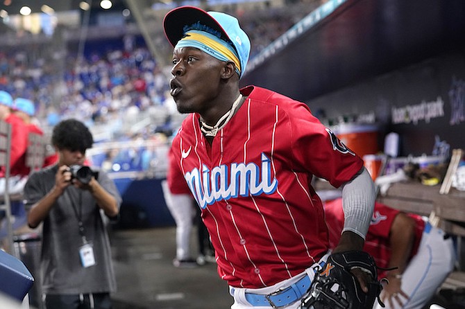 Miami Marlins second baseman Jazz Chisholm Jr. runs from the dugout during the first inning of a baseball game against the New York Mets, Saturday, June 25, 2022, in Miami. (AP Photo/Lynne Sladky)