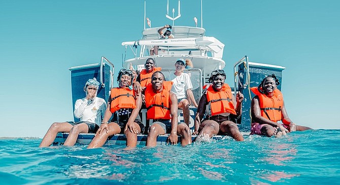 SEVEN students from LN Coakley High School in Exuma have been helping researchers from the Beneath the Waves organisation to tag sharks - and also enjoying a snorkel trip aboard the research vessel Tigress.