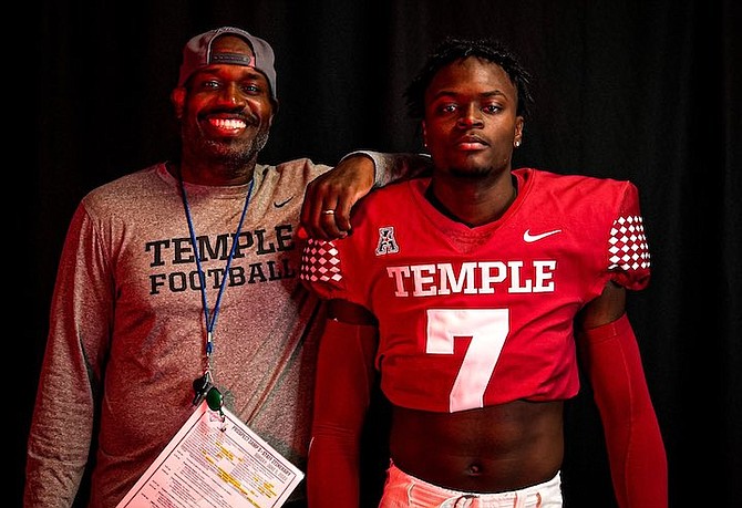 KALEB BARNETT, right, and Jules Montair, defensive backs coach at Temple.