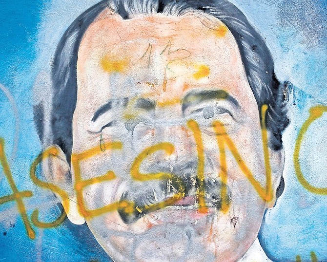 THE SPANISH word for “Murderer” covers a mural of Nicaragua’s President Daniel Ortega, as part of anti-government protests demanding his resignation in Managua, Nicaragua, in 2018. Four months before scheduled 2022 municipal elections, Nicaraguan riot police have taken over the city halls of five municipalities that had been in the hands of an opposition party. 
Photo: Esteban Felix/AP