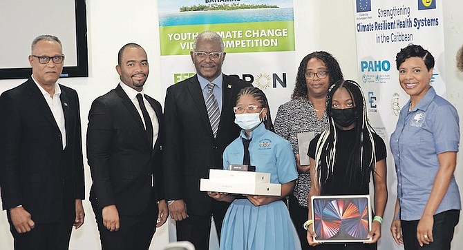 YOUTH climate change video competition winners receive their awards. Photo: Moise Amisial
