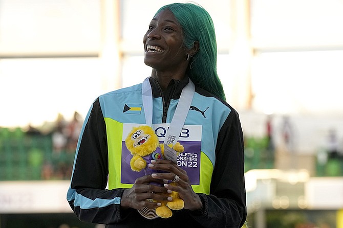 Gold medalist Shaunae Miller-Uibo during the medal ceremony. (AP Photo/Gregory Bull)