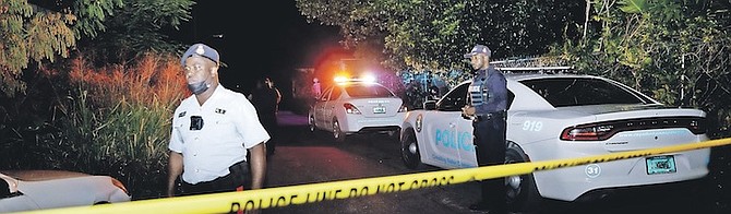 POLICE at the scene after a shooting in Fleming Street that led to the death of a child on Tuesday night. Photo: Austin Fernander